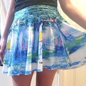 Alice in Wonderland cheshire cat all over pattern mini skater skirt pastel blue